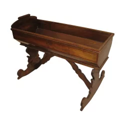 wooden rocking bed. Period: 20th century.
