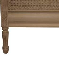 cane headboard in white painted wood with antique finish.