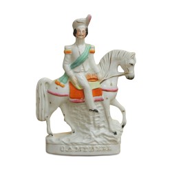 Une paire de cavalier staffordshire en faïence