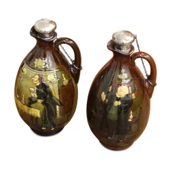 A pair of brown ceramic whiskey decanters