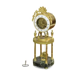 A Louis XVI gilt bronze and marble clock