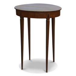 A Louis XVI Directory inlaid oval table