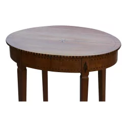 A Louis XVI Directory inlaid oval table