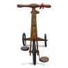 Un tricycle bois, roue métal. Travail Suisse - Moinat - Accessoires de décoration