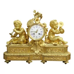 A richly decorated gilt bronze clock