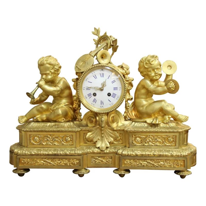 A richly decorated gilt bronze clock - Moinat - Table clocks