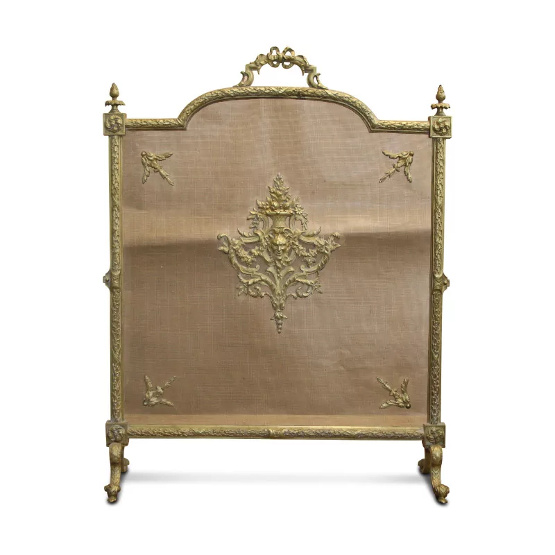 A richly sculpted Louis XVI gilt bronze ribbon fire screen - Moinat - Fire screens