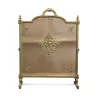 A richly sculpted Louis XVI gilt bronze ribbon fire screen - Moinat - Fire screens