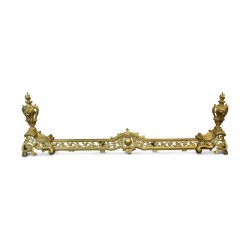 a pair of andirons in gilded bronze