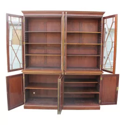 A mahogany bookcase mounted on fir
