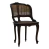 A richly carved caned armchair - Moinat - Armchairs
