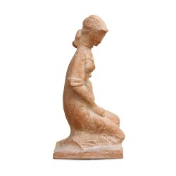 A terracotta sculpture signed Pierre Blanc