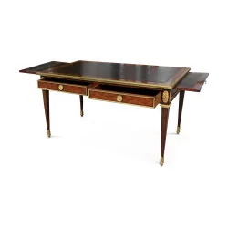 A Louis XVI desk in speckled mahogany wood