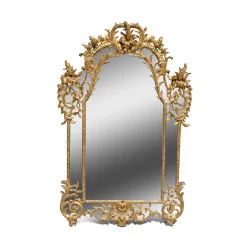 A Régence mirror in gilded wood, mercury mirror