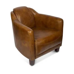 Un fauteuil Gentleman Whisky cuir de vachette