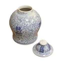 An ivory and blue porcelain herb pot