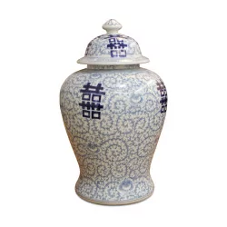 An ivory and blue porcelain herb pot