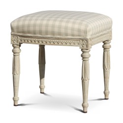 A hand-carved and painted solid wood stool