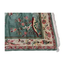 thick carpet with Japanese decorations in green, pink, white,