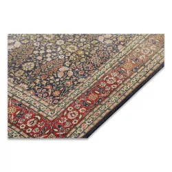 Oriental rug in red and green.