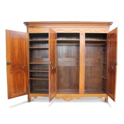 A Louis XV cabinet in molded walnut