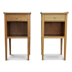 A pair of walnut bedside tables