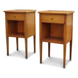 A pair of cherry bedside tables