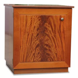 A flamed mahogany chest of drawers