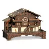 A wooden chalet with a music box - Moinat - Decorating accessories