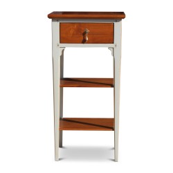 A glass of water drawer bedside table in cherry wood with gray body