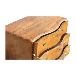 A walnut chest of drawers