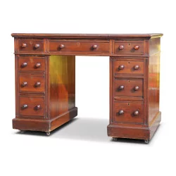A flat mahogany desk, original leather top