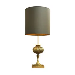 A bronze and brass light fixture