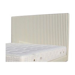 Une tête de lit moderne recouvert de tissu à rayures