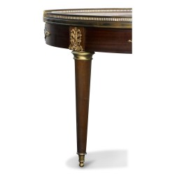 A small circular table, marble top