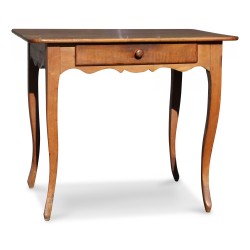 A small walnut table, carved legs