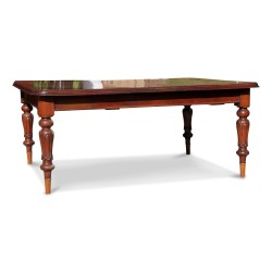 Une table acajou rallonge mécanique