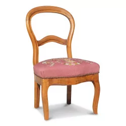 A walnut seat covered with gobelin