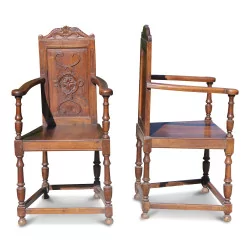 A pair of carved walnut seats