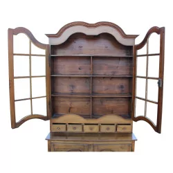 A glazed walnut cabinet, four openings