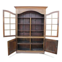 A glazed walnut shelf, four openings