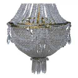 A bronze and crystal light fixture, five lights