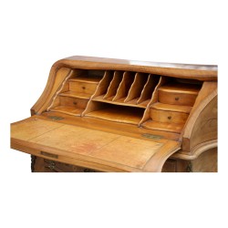 Un bureau cylindrique richement marqueté