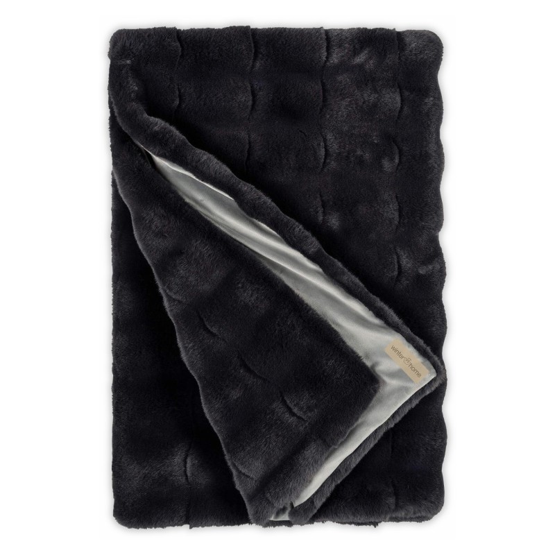 Une couverture en fourrure artificielle - Moinat - Couvertures, Plaids