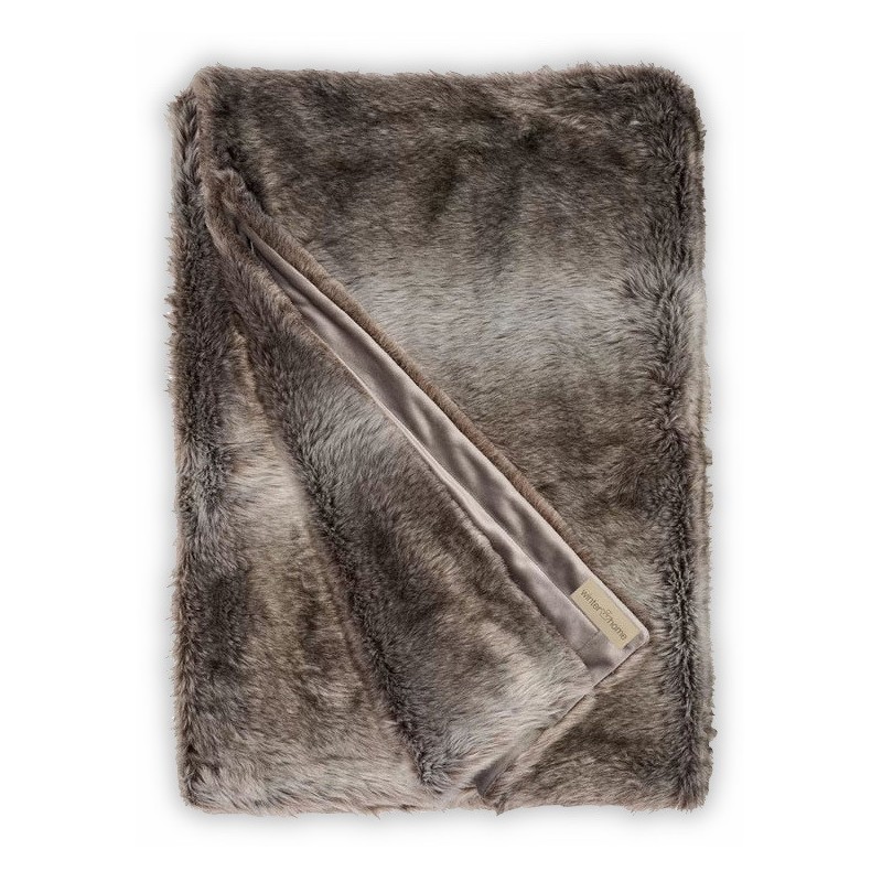 Une couverture en fourrure artificielle - Moinat - Couvertures, Plaids