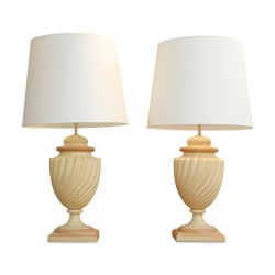 A pair of beige and salmon ceramic lighting fixtures