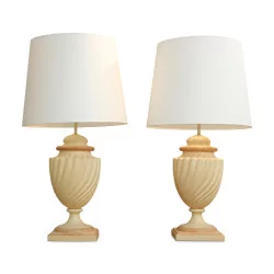 A pair of beige and salmon ceramic lighting fixtures