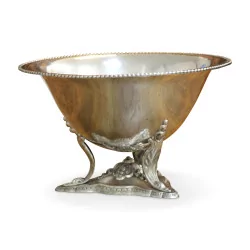 A hammered silver cup without hallmarks