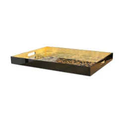A black and gold lacquered serving tray