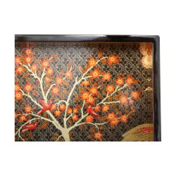 A lacquered serving tray with oriental motifs